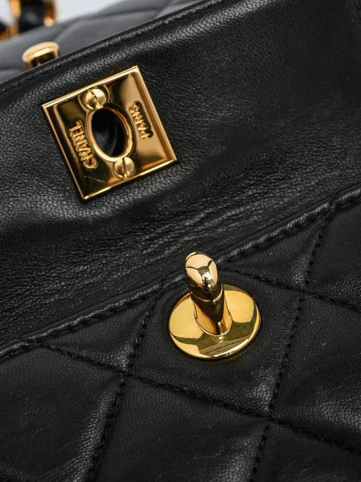 Black Quilted Lambskin Mini Timeless CC Duma Backpack Gold