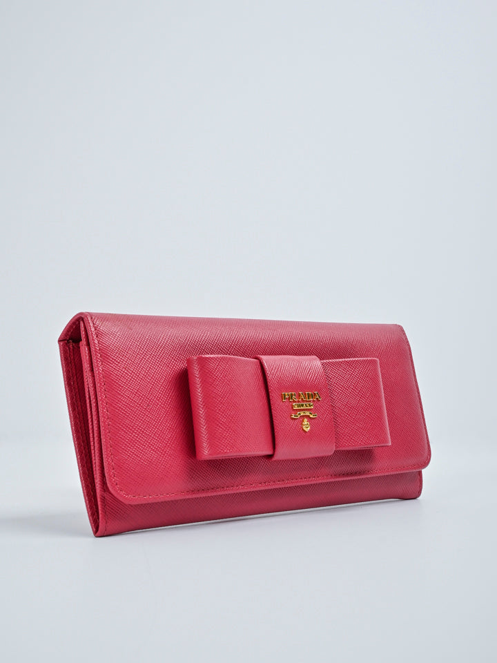 Prada Saffiano Vernice Bow Continental Wallet - FINAL SALE (SHF-19372) –  LuxeDH